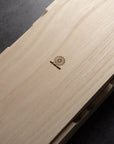 Wooden product with a Wancher on a dark background