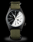 Wancher Gurkha on wrist in forest – Japanese field watch for rugged outdoor missions