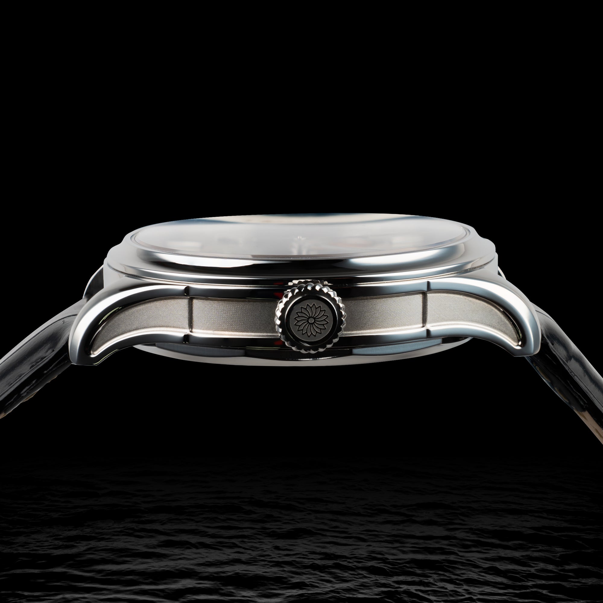 Close-up of a silver watch with a dark background TSUKIMI Gold Moon Disk Dial  Dream Moonphase Kaguya AKANE Wancher Watch  Archlit Case