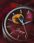 Watch face with moon phase indicator and 'Kaguya ' branding on a red Raden Pearl Dial backgroundTSUKIMI Gold Moon Disk Dial Dream Moonphase Kaguya AKANE Wancher Watch