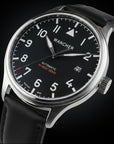 Wacher watch Flugel with black dial and a leather strap on a dark background