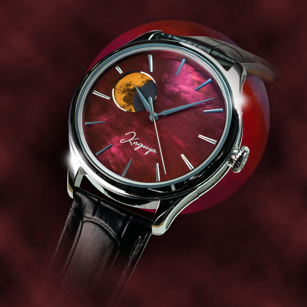 Watch with a red face and black strap on a dark background  TSUKIMI Gold Moon Disk Dial  Dream Moonphase Kaguya AKANE Wancher Watch 