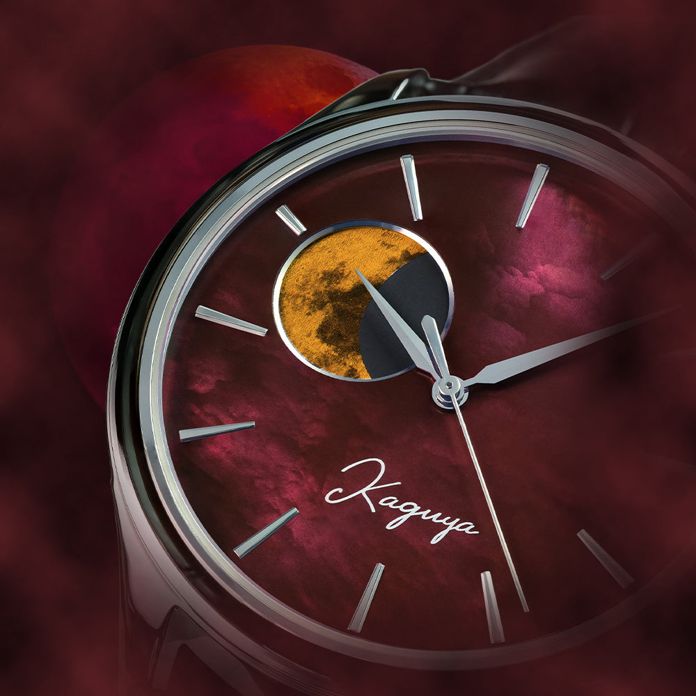 Watch face with moon phase indicator and &#39;Kaguya &#39; branding on a red Raden Pearl Dial backgroundTSUKIMI Gold Moon Disk Dial  Dream Moonphase Kaguya AKANE Wancher Watch 