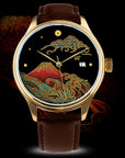 Gold watch with red Japanese Urushi dial, wave and mountain design, black leather strap