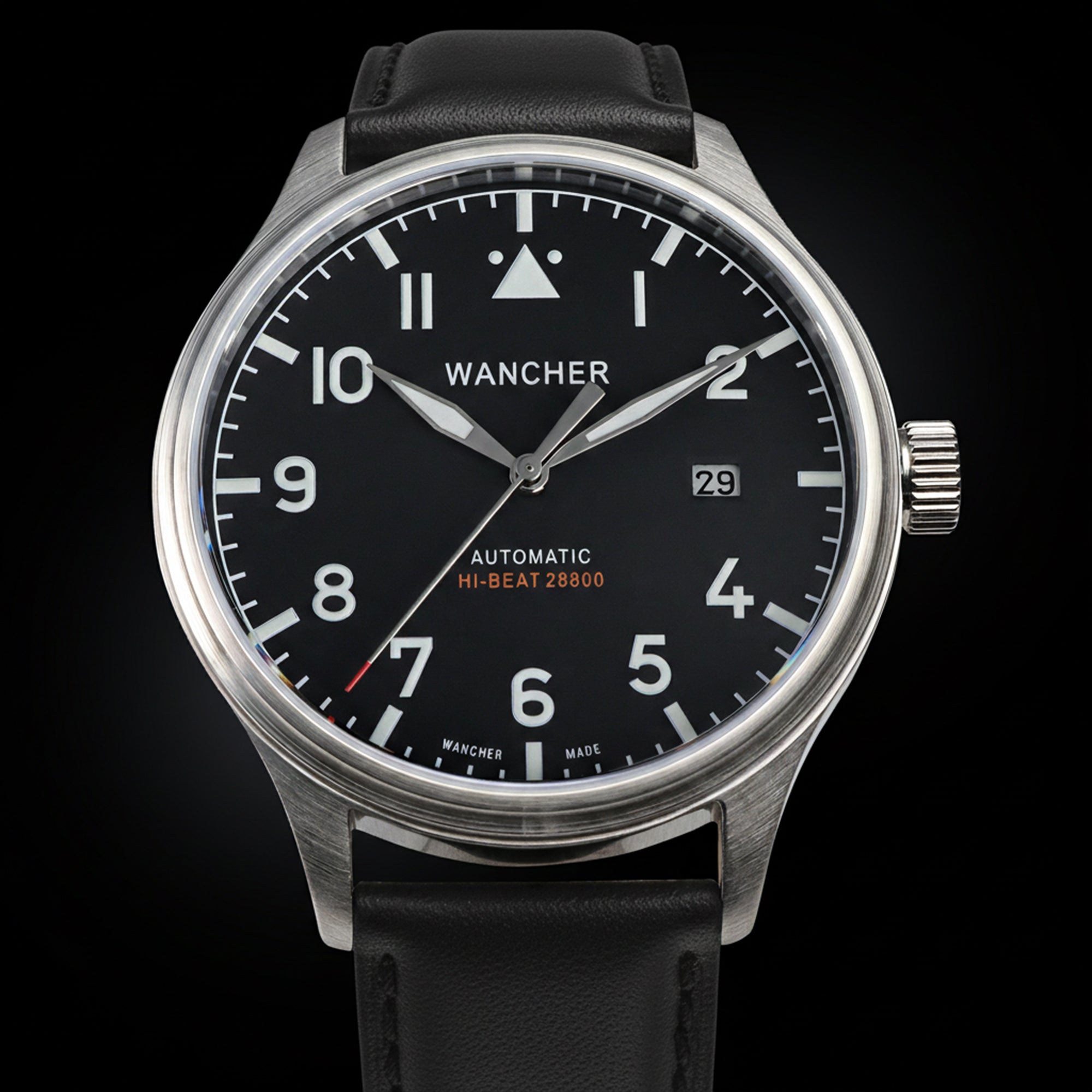 The Wancher Flugel Automatic Watch Miyota 9015 Pilot Watch, featuring a silver case, black face, and brown textured strap, modelled on a wrist.